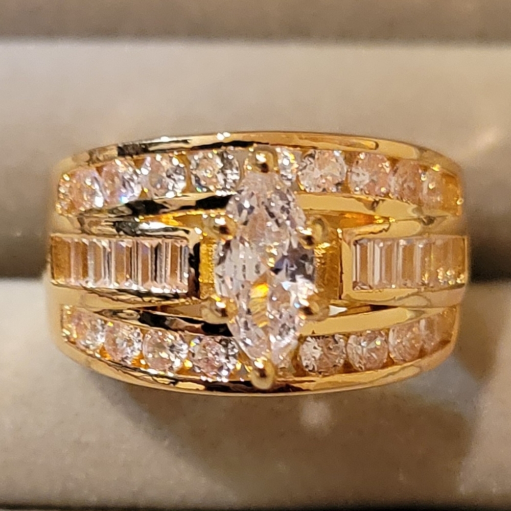Gold zircon three row ring